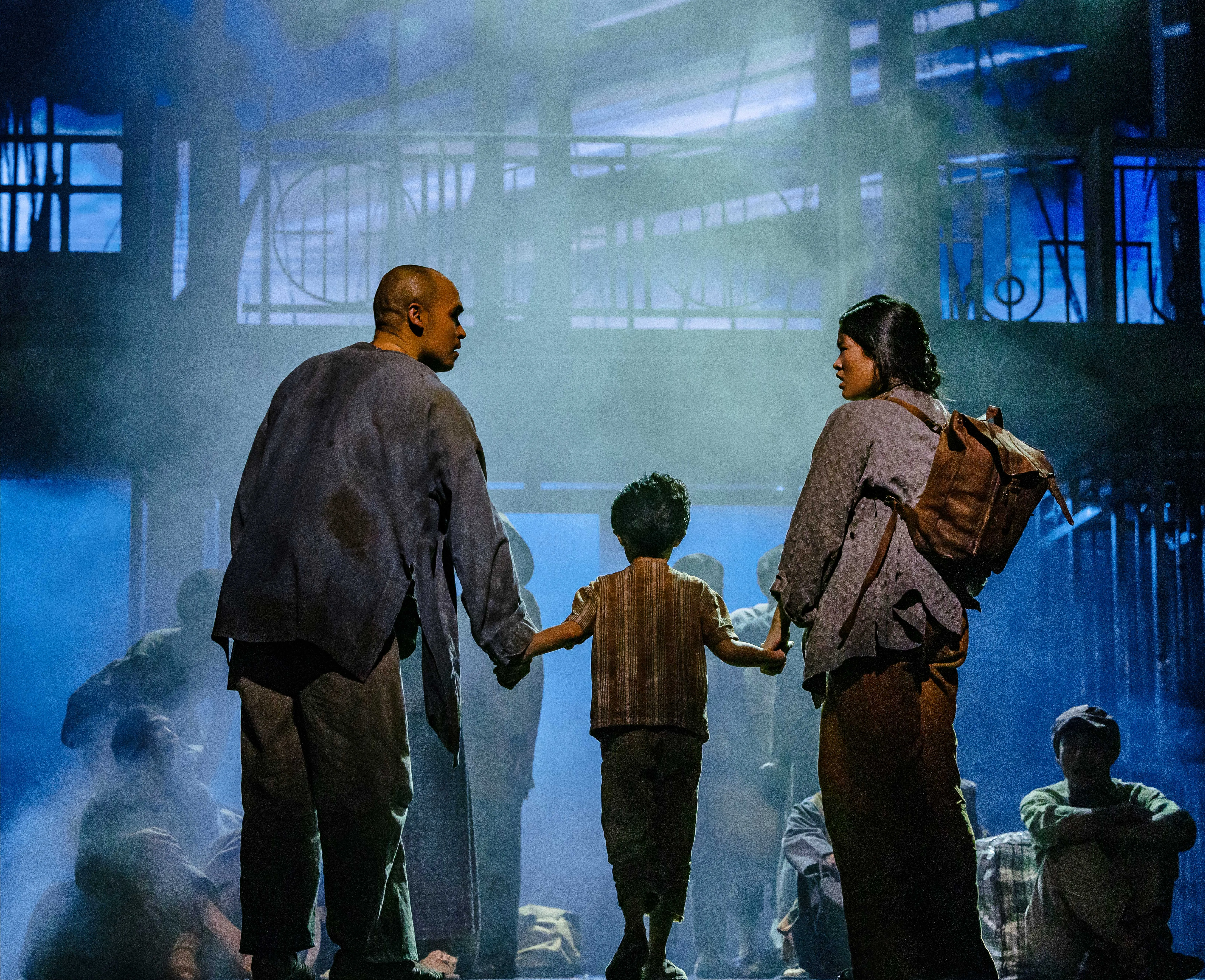 Seann Miley Moore as the Engineer with Julianne Pundan as Kim and the company
