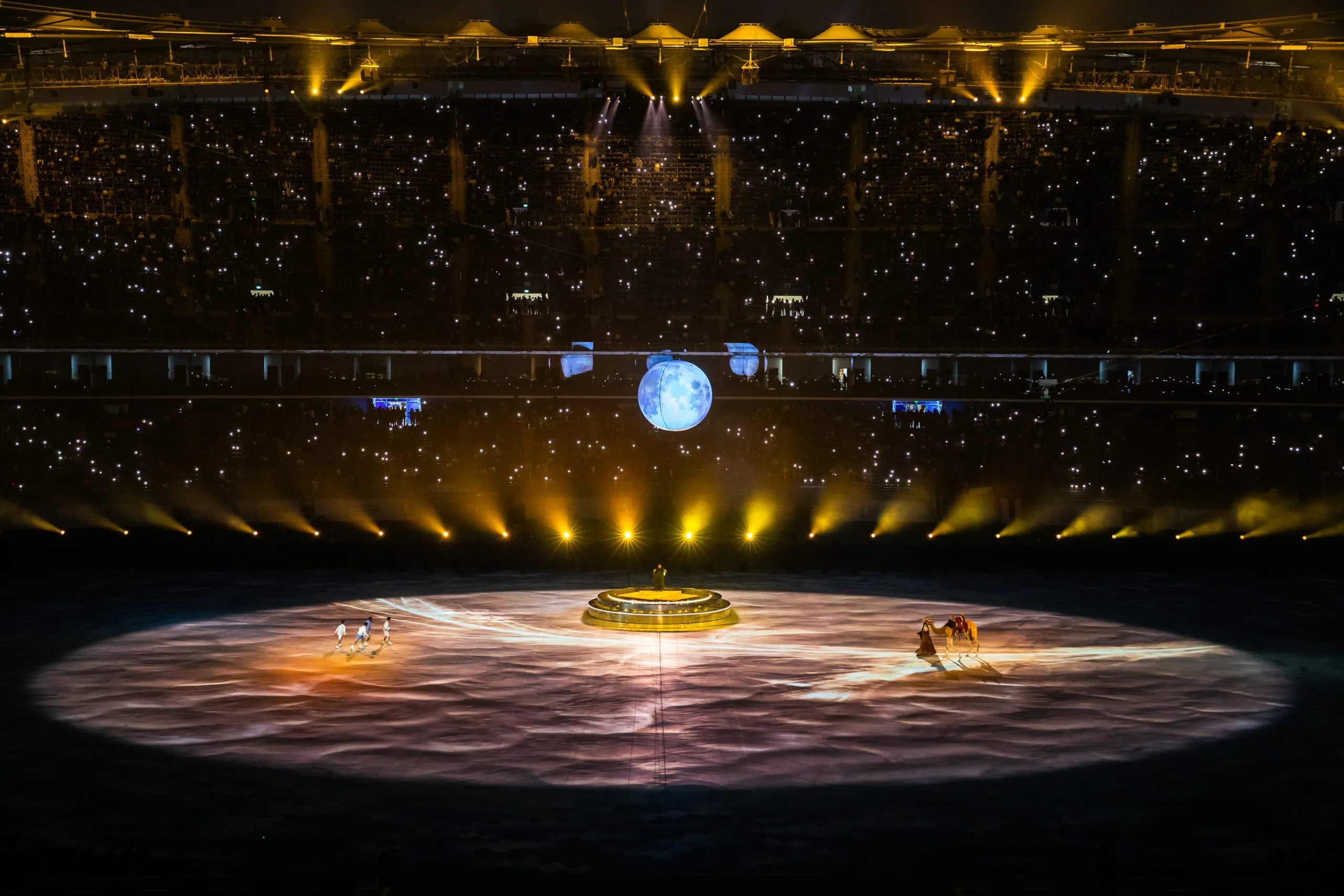 Ceremony stage with performers — 26th Arabian Gulf Cup opening ceremony