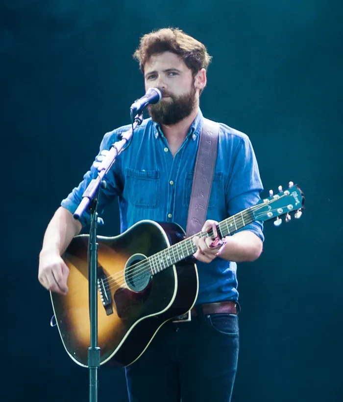 Passenger — Mike Rosenberg — performing live with an acoustic guitar