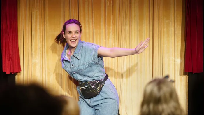 Charlie Russell in her solo show Aims To Please at Pleasance Courtyard, Edinburgh Fringe 2022